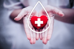 hand giving red heart for help blood donation hospital or healthcare concept t20 nXRRR6 1